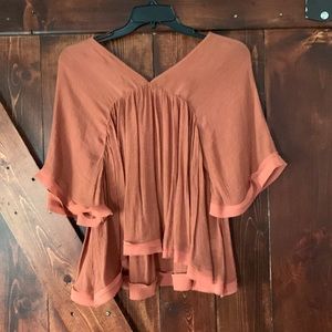 Orange flowy top